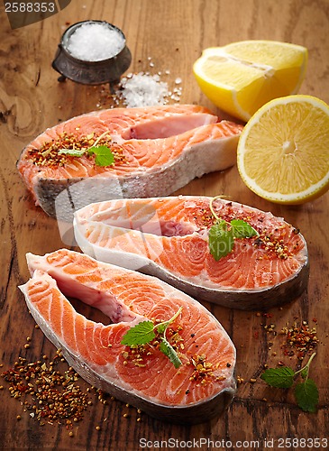 Image of fresh raw salmon steak slices