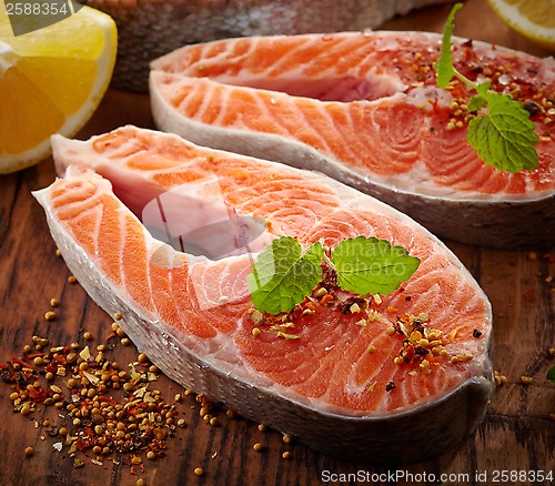 Image of fresh raw salmon steak slices