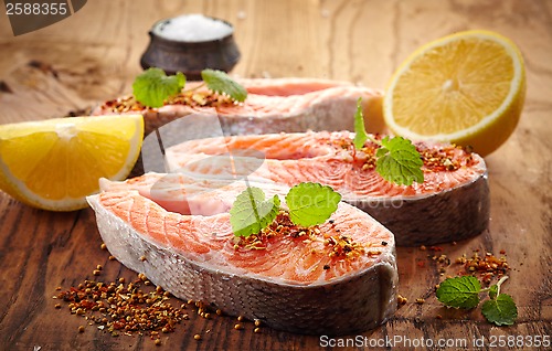 Image of fresh raw salmon steak slices