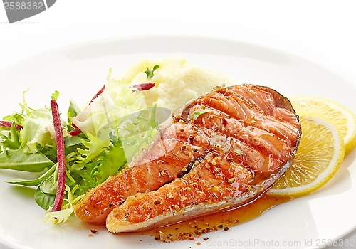 Image of fresh grilled salmon steak slice