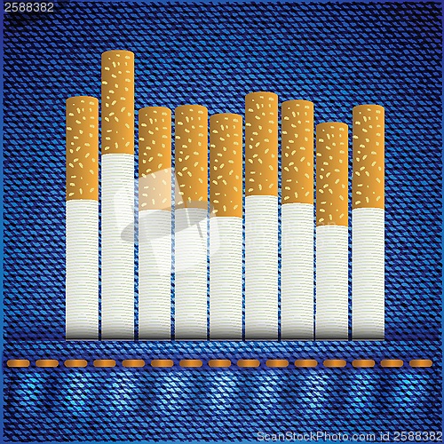 Image of cigarettes on bllue jeans background