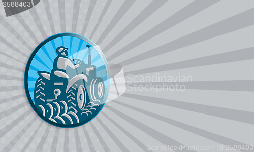 Image of Farmer Plowing With Tractor Retro