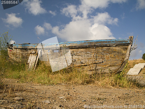 Image of Old nautical vessel - abandoned on the dry land