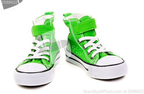Image of green sneakers with white laces