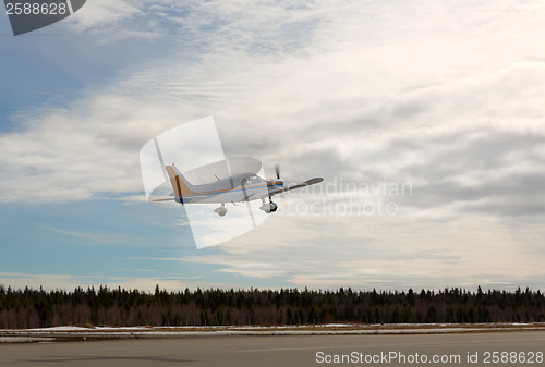 Image of private propeller plane takes off