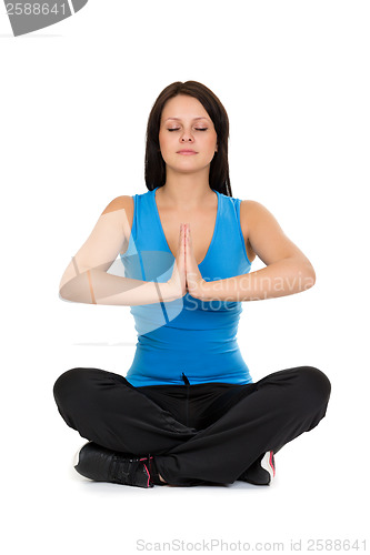 Image of girl sitting in the lotus position