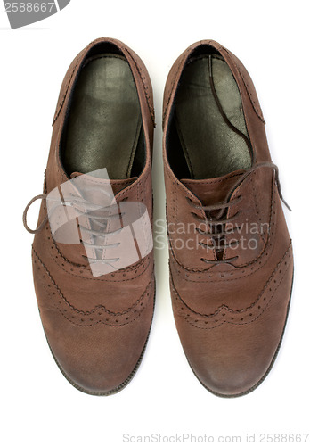 Image of pair of brown casual design women's shoes. View from above