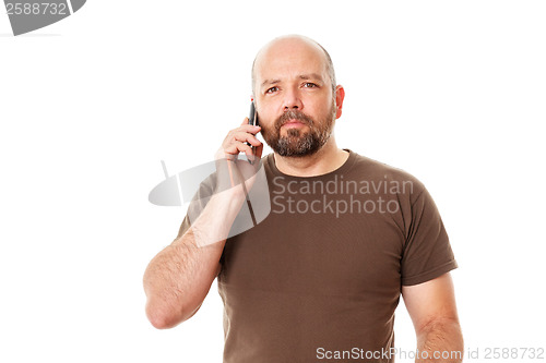 Image of bearded man at the phone