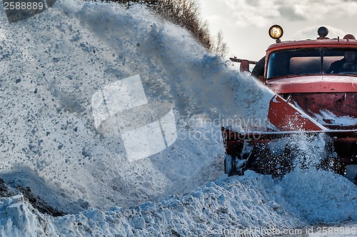 Image of truck cleaning road in winter