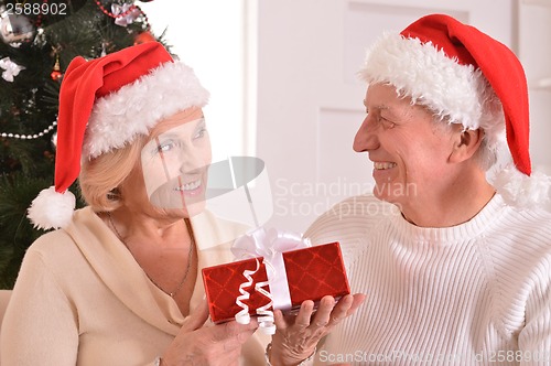 Image of Mature couple celebrating new year