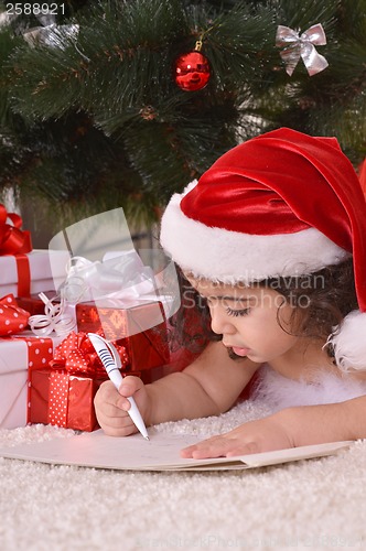 Image of Little girl celebrating Christmas