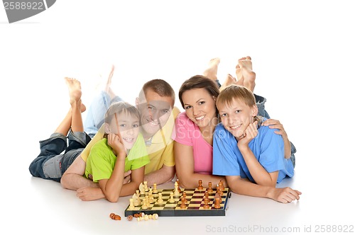 Image of Family playing chess