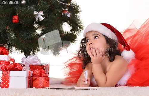 Image of Little girl celebrating Christmas