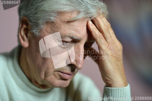 Image of Elderly man thinking