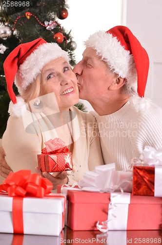 Image of Mature couple celebrating new year