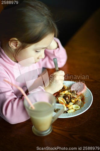 Image of Little baby eats