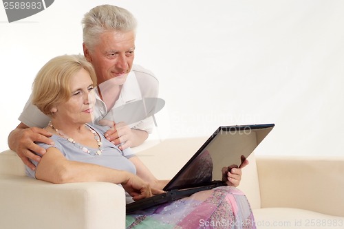 Image of Elderly couple with laptop