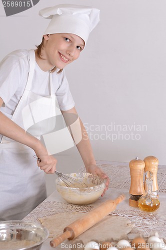 Image of Boy knead the dough