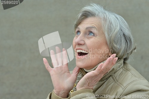 Image of Happy woman posing in autumn