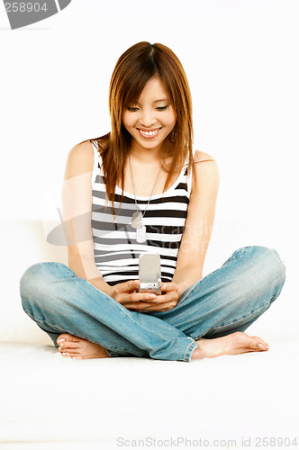 Image of Holding cell phone