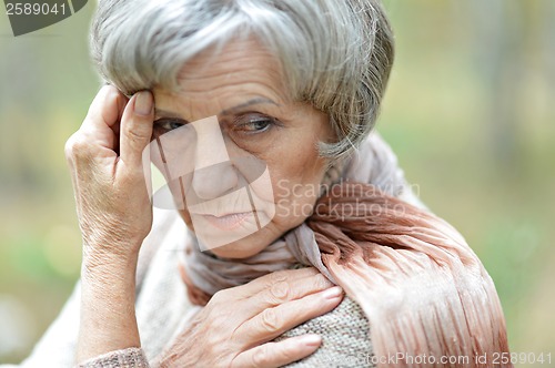 Image of Pensive elderly woman