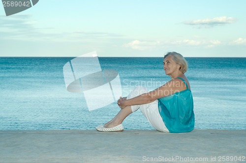 Image of Happy elderly woman