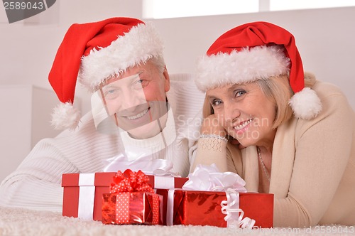 Image of Mature couple celebrating new year