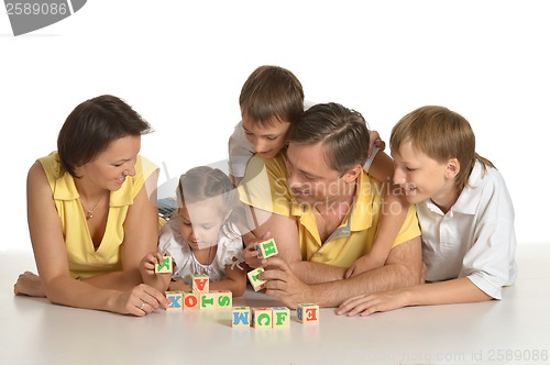 Image of Family playing indoors