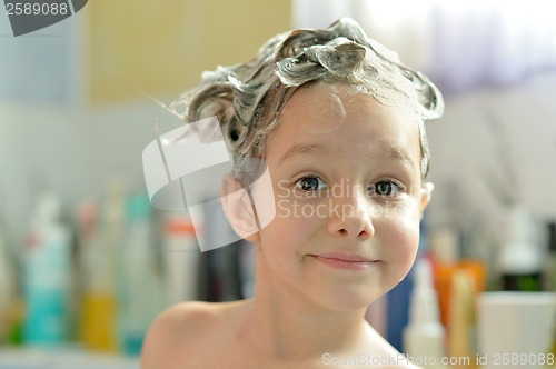 Image of Little girl in bath