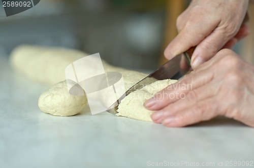 Image of Woman making dough