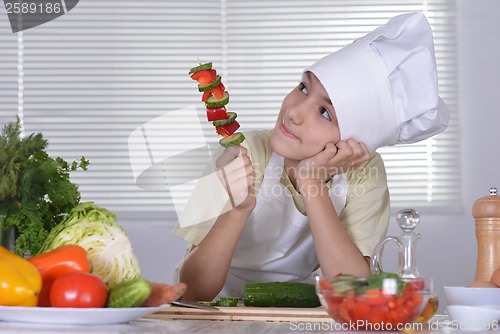 Image of Cute boy preparing