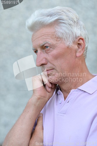 Image of Thinking elderly man
