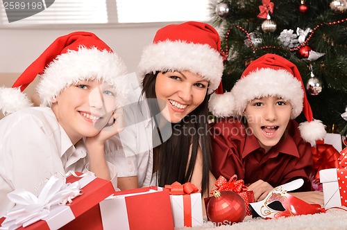 Image of Family with christmas gifts