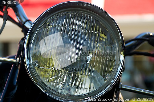 Image of vintage motorcycle headlight