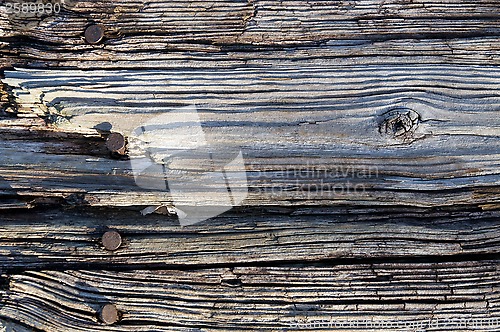 Image of close up of old wood rusty nails