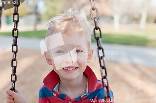 Image of kid swinging