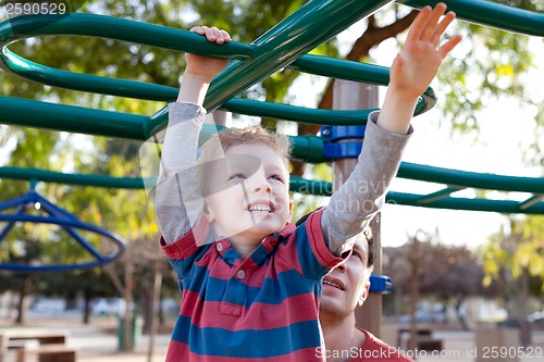 Image of family at kids playground