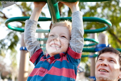 Image of family at kids playground