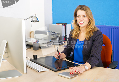 Image of Smiling woman at work