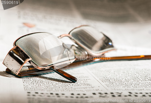 Image of Glasses on newspaper