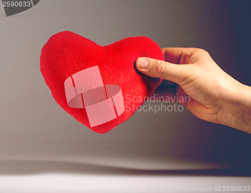 Image of Vintage look red plush heart.