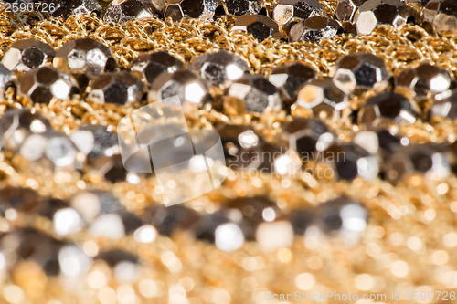 Image of Shiny ornaments on handbag