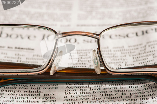 Image of Glasses on newspaper