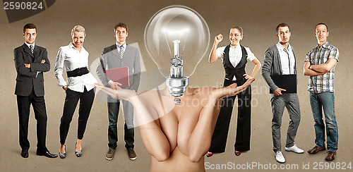 Image of Business Team With Lamp Head