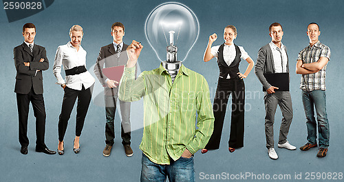 Image of Business Team With Lamp Head