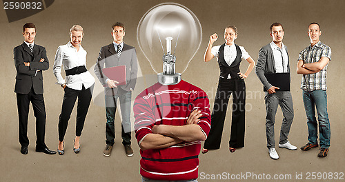 Image of Business Team With Lamp Head