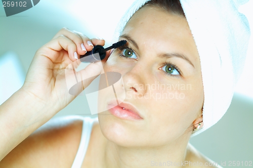 Image of Girl doing makeup