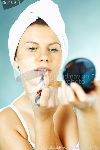 Image of Girl doing makeup