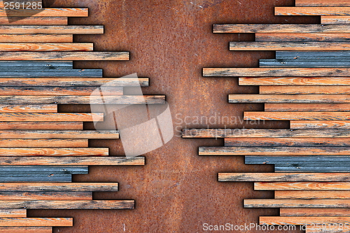 Image of montage of wood planks on rusty surface
