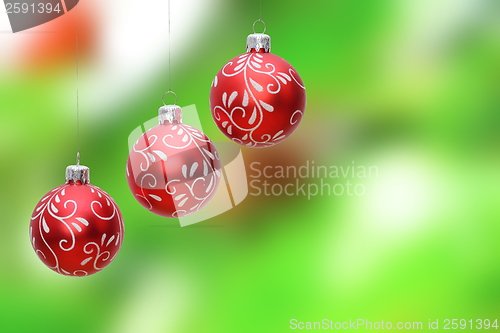 Image of three christmas balls hanging